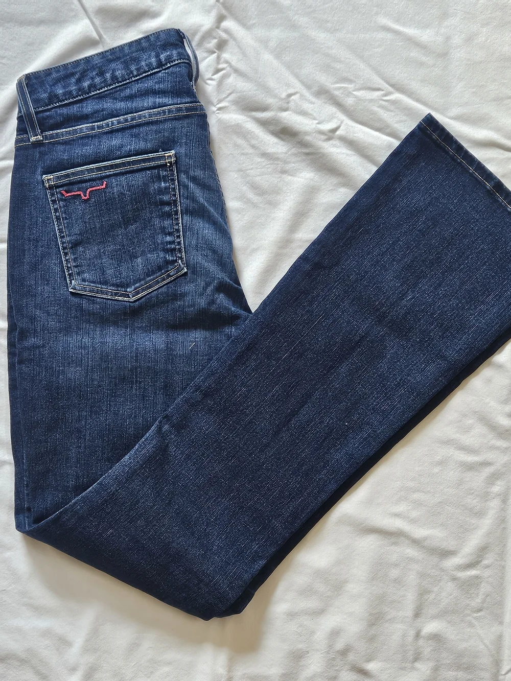 Kimes Ranch Women’s Dark Blue Boot Cut Jeans with Pink Accent
